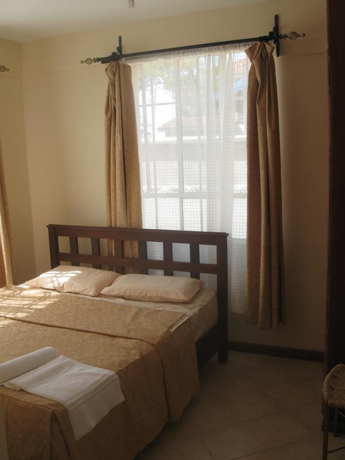 Cosy Garden Guesthouse Кисуму Экстерьер фото